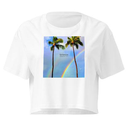 White crop top with graphic of palm trees and a rainbow.