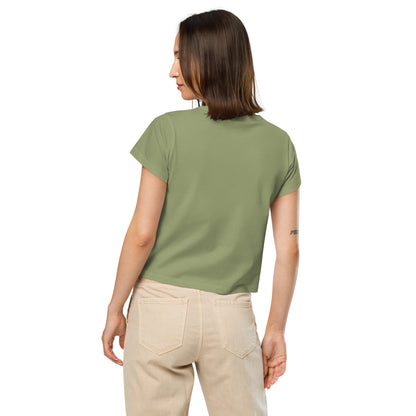 Rear view of woman wearing green t-shirt.