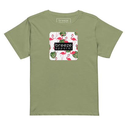 Light-green t-shirt with pattern of flamingos inside of a square, overlaid with a black box with 'breeze apparel' in white inside.