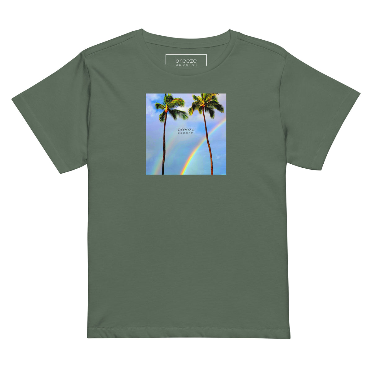 Pine-green t-shirt with a graphic of palm trees, rainbow, and a clear blue sky in the background. A small, black 'breeze apparel' logo is between the trees.