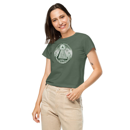 Woman wearing green t-shirt with graphic resembling pyramid on US one-dollar bill.
