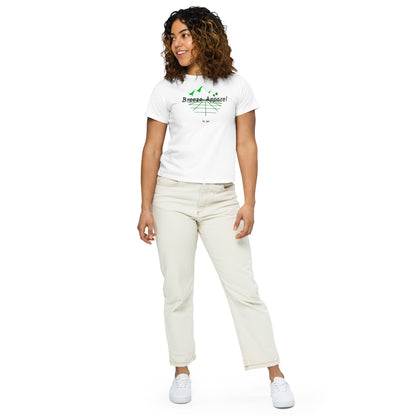 Woman wearing white t-shirt with 'Breeze Apparel' logo set on a graphic of a grid, palm trees, and mountains.