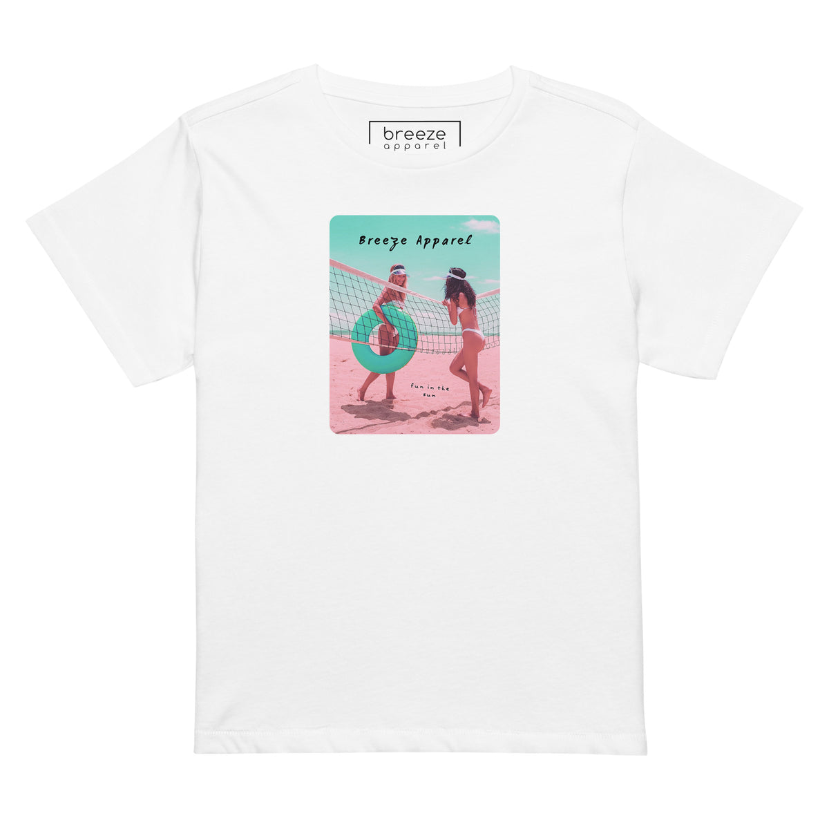 White t-shirt with an image of two women in bikinis on the beach, standing by a volleyball net, one holding a swim ring and smiling, the other leaning on the net, with inscription in black of 'breeze apparel' towards the top of the image, and 'fun in the sun' in black on the ground between the women. 