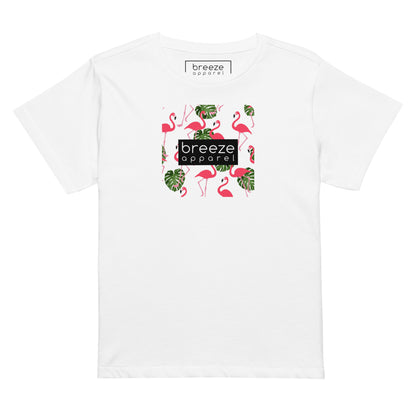 White t-shirt with pattern of flamingos inside of a square, overlaid with a black box with 'breeze apparel' in white inside.