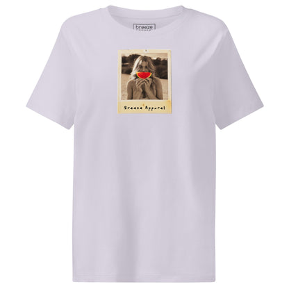 Lavender t-shirt with graphic of woman holding a watermelon slice in front of her mouth.