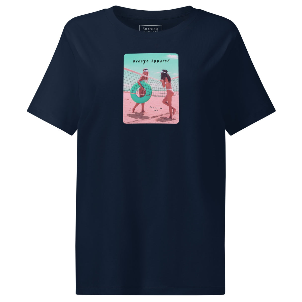 Navy t-shirt with an image of two women in bikinis on the beach, standing by a volleyball net, one holding a swim ring and smiling, the other leaning on the net, with inscription in black of 'breeze apparel' towards the top of the image, and 'fun in the sun' in black on the ground between the women. 