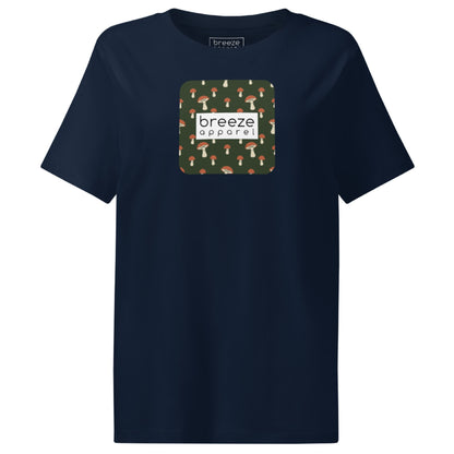 Navy t-shirt with square graphic of mushrooms set on a green background overlaid with a white rectangle in which 'breeze apparel' is in black.