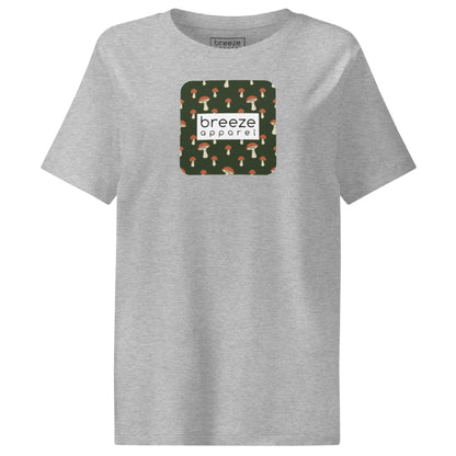 Gray t-shirt with square graphic of mushrooms set on a green background overlaid with a white rectangle in which 'breeze apparel' is in black.