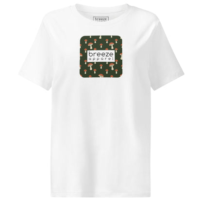 White t-shirt with square graphic of mushrooms set on a green background overlaid with a white rectangle in which 'breeze apparel' is in black.