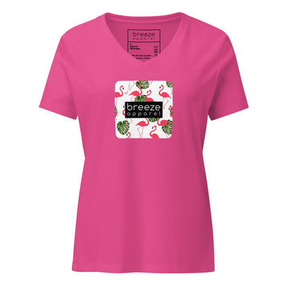 Pink v-neck t-shirt with graphic of flamingos overlaid with black logo.