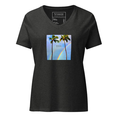 Dark-gray-heather v-neck t-shirt with a graphic of palm trees, rainbow, and a clear blue sky in the background. A small, black 'breeze apparel' logo is between the trees. 