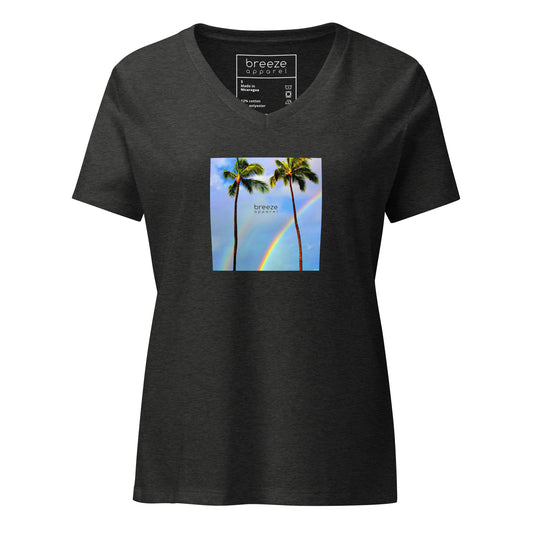 Dark-gray-heather v-neck t-shirt with a graphic of palm trees, rainbow, and a clear blue sky in the background. A small, black 'breeze apparel' logo is between the trees. 