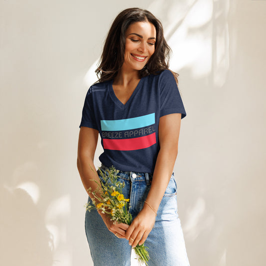 Woman wearing navy v-neck t-shirt with gray 'Breeze Apparel' logo between horizontal bars, the top being light blue and the bottom being red.