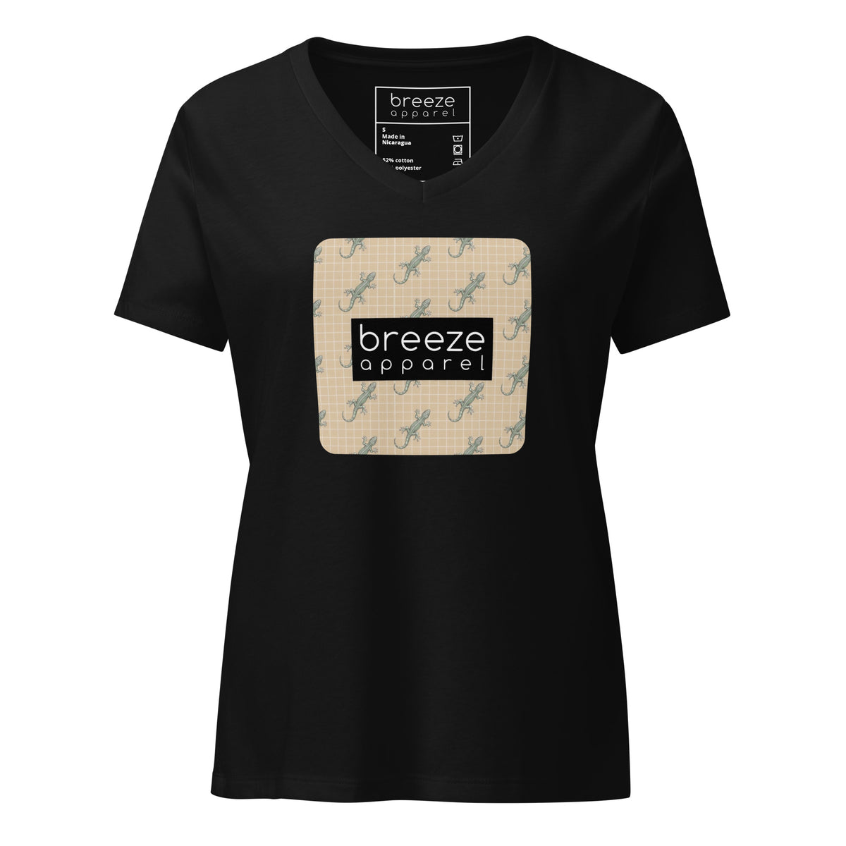 Black t-shirt with square over chest that contains pattern of green geckos set on beige background, overlaid with black, rectangular logo with white lettering.